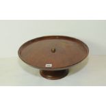 Mahogany circular lazy susan on domed circular base, 17¼" diam.