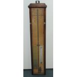 Admiral Fitzroy's barometer of typical style with printed observations, in plain oak case.