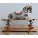 Late Victorian shaddle type rocking horse by Ayres in original condition with dapple grey paint,