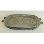 Large antique pewter twin handled oval warming ashet with impressed mark for I. Vickers, 23" wide.