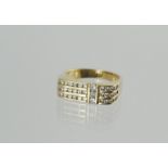 Diamond ring with three rows of channel set brilliants, in gold '750', size M½.