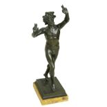 Victorian cast bronze figure of Bacchus standing on rectangular plinth with yellow onyx base,