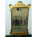 Mid Georgian wall mirror, the rectangular glass with rounded top,