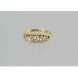 Victorian five stone diamond ring with old cut brilliants, in 18ct gold, 1897, size N.