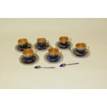 Set of six Royal Worcester demi-tasse coffee cups & saucers,