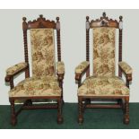 Substantial pair of Victorian oak framed hall chairs in the Carolean style,