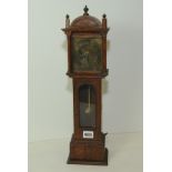 Smiths electric mantel clock in the form of an oak longcase clock with brass dial & pendulum,