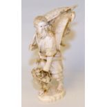 Finely carved Japanese Meiji period large ivory mono-block okimono of a hunter carrying an eagle &