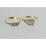 Diamond three stone ring, '18ct & pt', size Q & another with emeralds, size 0½. (2).