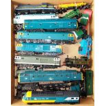 Tray of various unboxed locos, many needing attention.