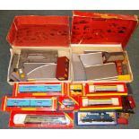 Mixed box of two locos, some platforms, rolling stock, etc. Some boxed.