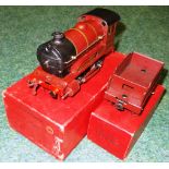 Hornby 0 gauge. 501 loco & tender; 0-4-0 clockwork loco. 5600, maroon, L.M.S. Both good condition.