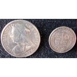 Two brooched Victorian coins.