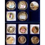 Eleven various gold plated commemorative medallions, some with pad prints. In two boxes.