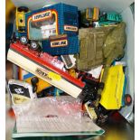 Tin of various diecast toys.