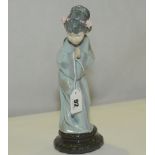 Lladro porcelain figure of a geisha "Sayonara", 10¾" high.