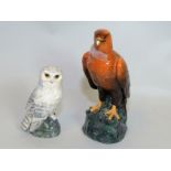 Two Royal Doulton Whyte & Mackay Scotch Whisky decanters, Golden Eagle, 10½" high & Snowy Owl,