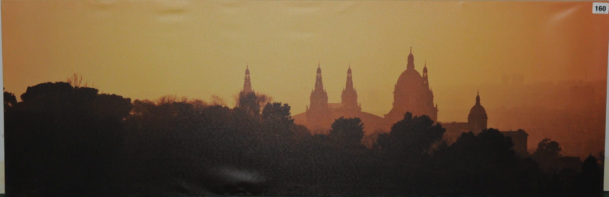 Modern photographic canvas of a Continental skyline with cathedral at sunset, 16" x 47¼".