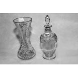 Clear glass decanter of ovoid form with faceted neck, etched scrolling rose band,