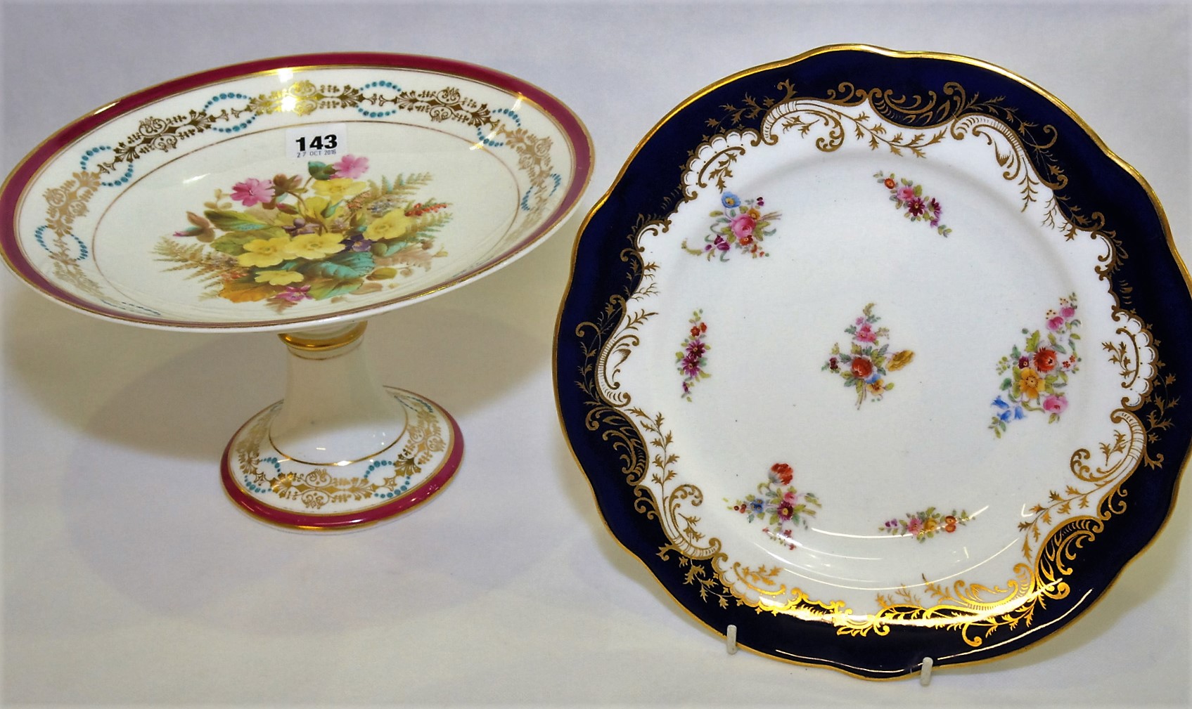 19th century English porcelain dessert comport with central polychrome floral decoration surrounded