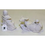 Two Chinese blanc de chine figures of Buddha holding a lucky bat,