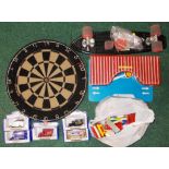 Box of mixed Lego, dartboard, skateboard (defective), toy garage etc.