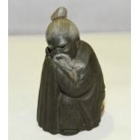 Lladro grey porcelain "Ancient Orient" figure of a crouching Chinaman, 6¾" high.