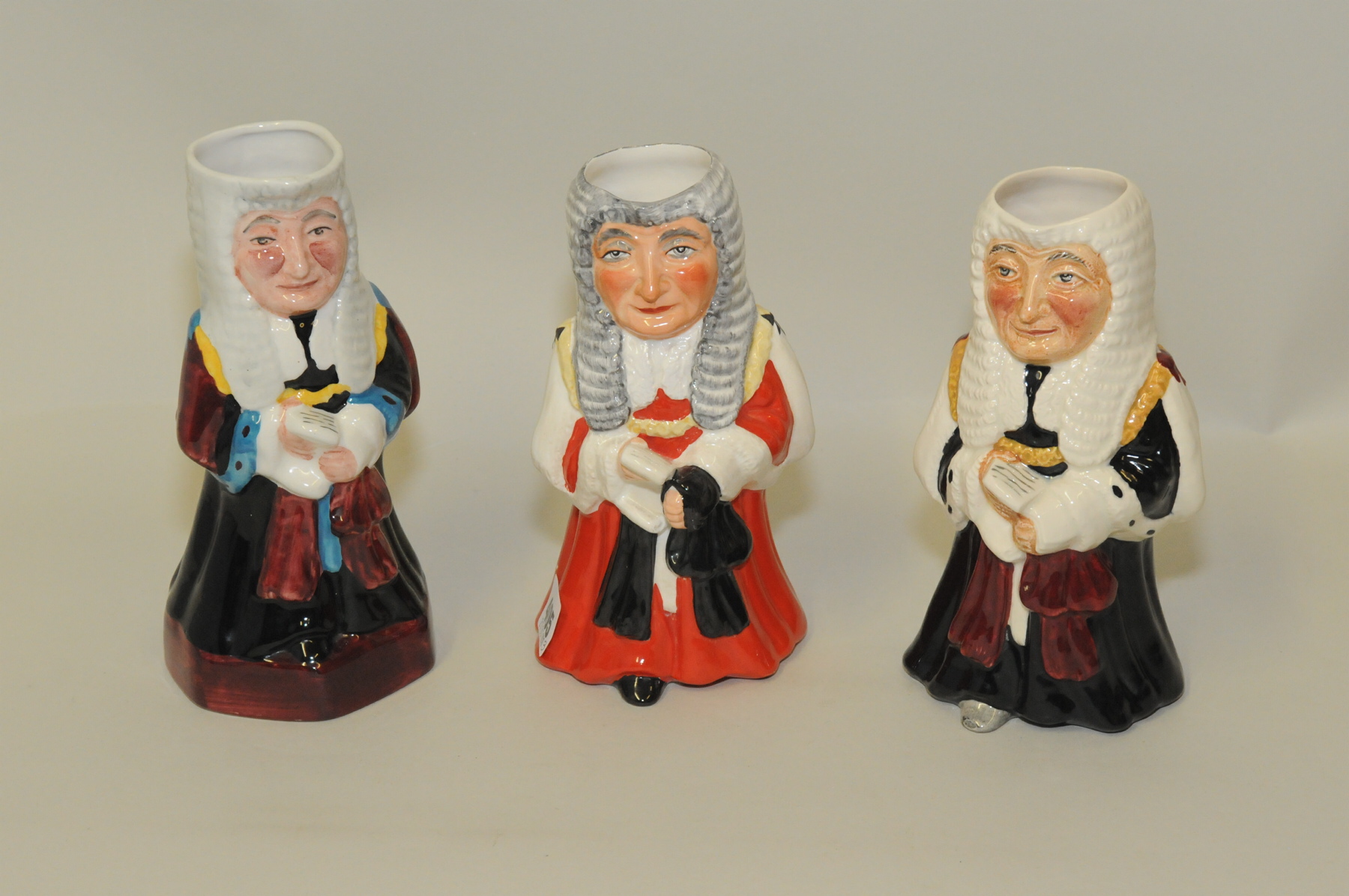 Three Toby jugs of The Lord Chief Justice by Wedgwood & Co. Ltd.