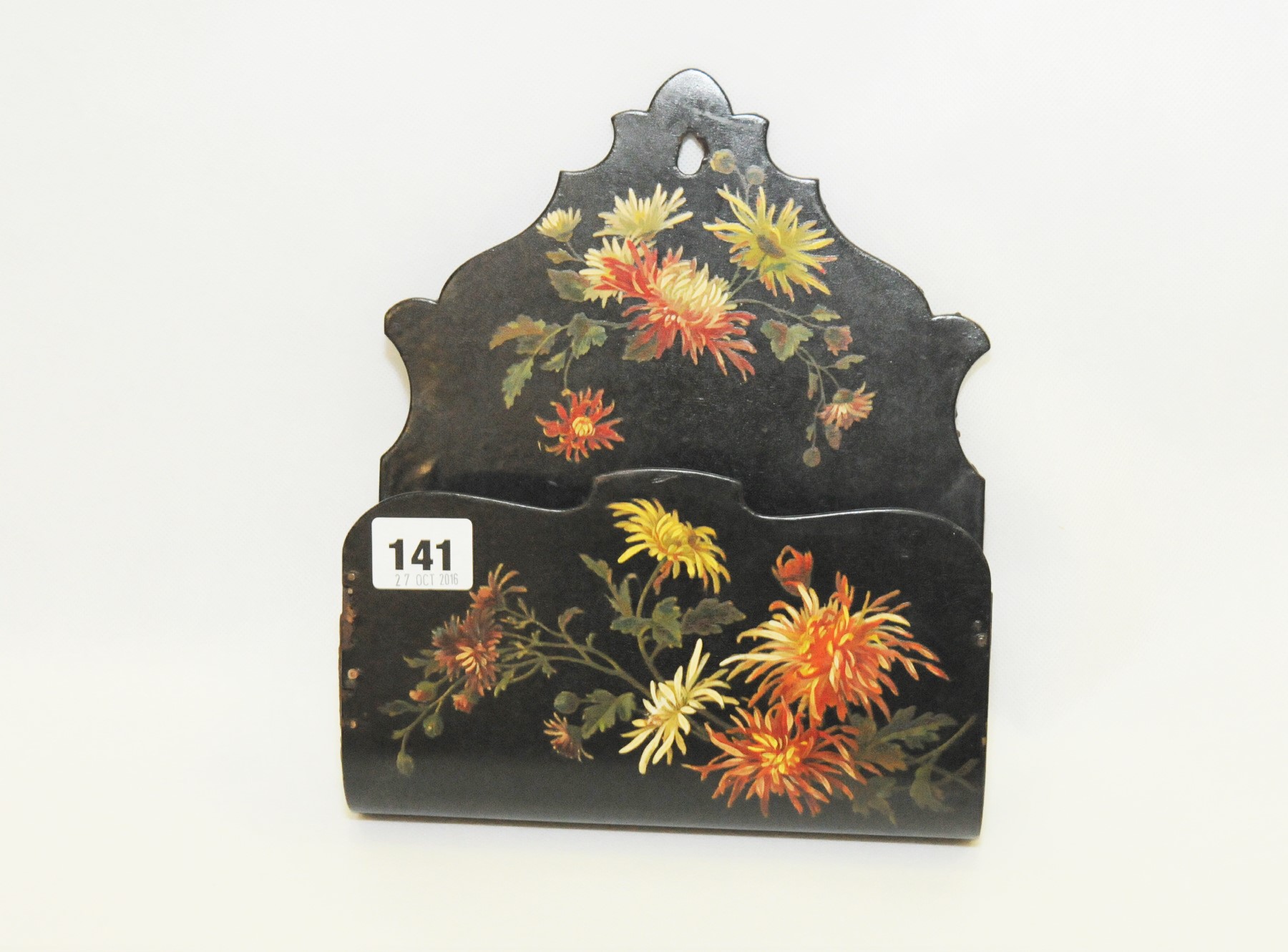 Papier mâché black lacquer wall pocket with polychrome decoration of chrysanthemums, 9½" high.