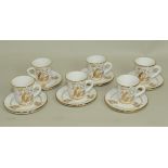 Modern Greek pottery coffee set for six settings with polychrome & gilt decoration depicting