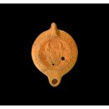 Roman Oil Lamp with Horned Mask