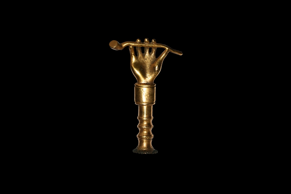 Post Medieval Gilt Hand Holding Smoking Pipe Tamper - Image 2 of 2