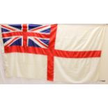 An original Royal Navy white ensign flag 55 inches by 110 inches