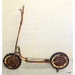 An Oriental Triang scooter with original grips, tyres, stand and brakes 90cm high