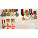 Three sets of family medals starting with a mounted WW1 & WW2 medal group consisting of the WW1 trio