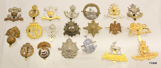 20 assorted military cap badges