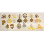 20 assorted military cap badges