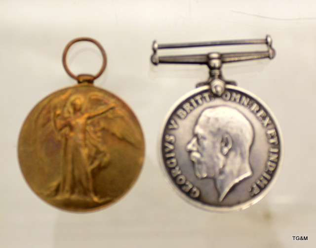 A WW1 medal pair named to 3-8081 Acting Corporal R Russell of the Northumberland Fusiliers who