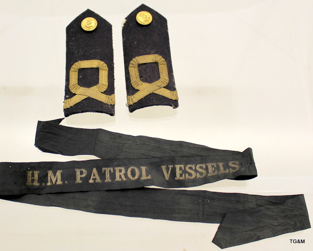 An original HM Patrol Vessels cap tally 34 inches long with a pair of Naval epaulettes