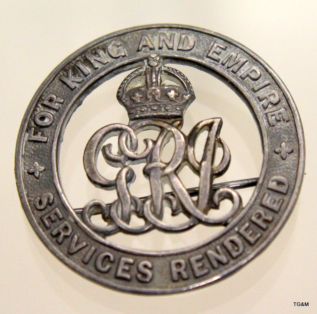 A WW1 Silver War Badge for Services Rendered numbered 108618 with a copy of the badge Roll showing