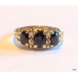 A 9ct gold antique style diamond and sapphire ring size m