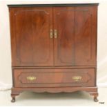 A reproduction 3 door TV cabinet 99 x 87 x 45