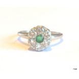 A 14 ct whit gold diamond emerald ring approx 0.75 diamond size q