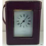 A French brass carriage clock and case supplied by John Bull - Bedford