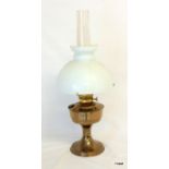 An oil lamp and glass flue