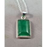 A silver and jade pendant necklace