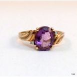 A 9ct gold amethyst and diamond ring size P