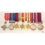 A WW2 mounted medal group of dress miniature medals including the OBE - GSM with Palestine clasp -