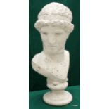 A Roman bust statue 61cm high