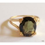A 9ct gold hallmarked antique style green stone ring size S